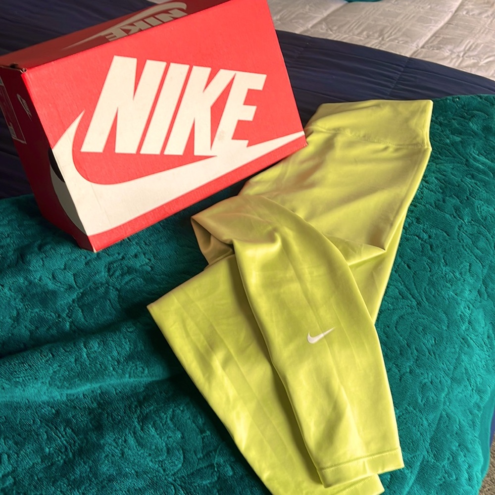 Nike DriFit Running Tights in fun Citrine color! EUC.  Worn a handful of times!